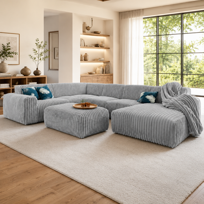 Canapé d'angle panoramique en velours côtelé gris avec pouf assorti